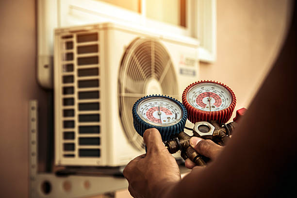 Professional Heat Pump Repair technician working in Olive Branch, MS